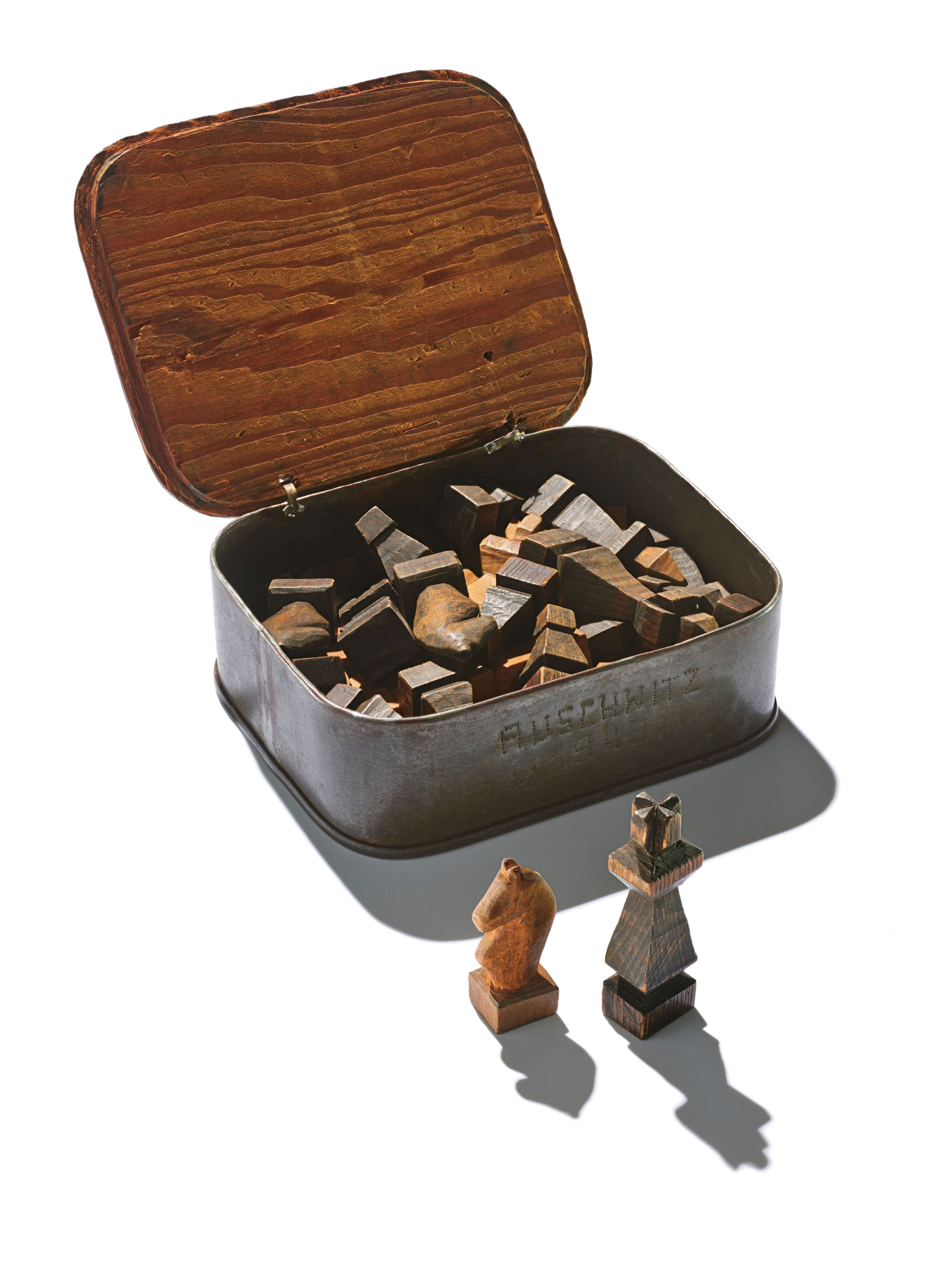 Prisoner-made chess set with storage box made out of a sardine tin.