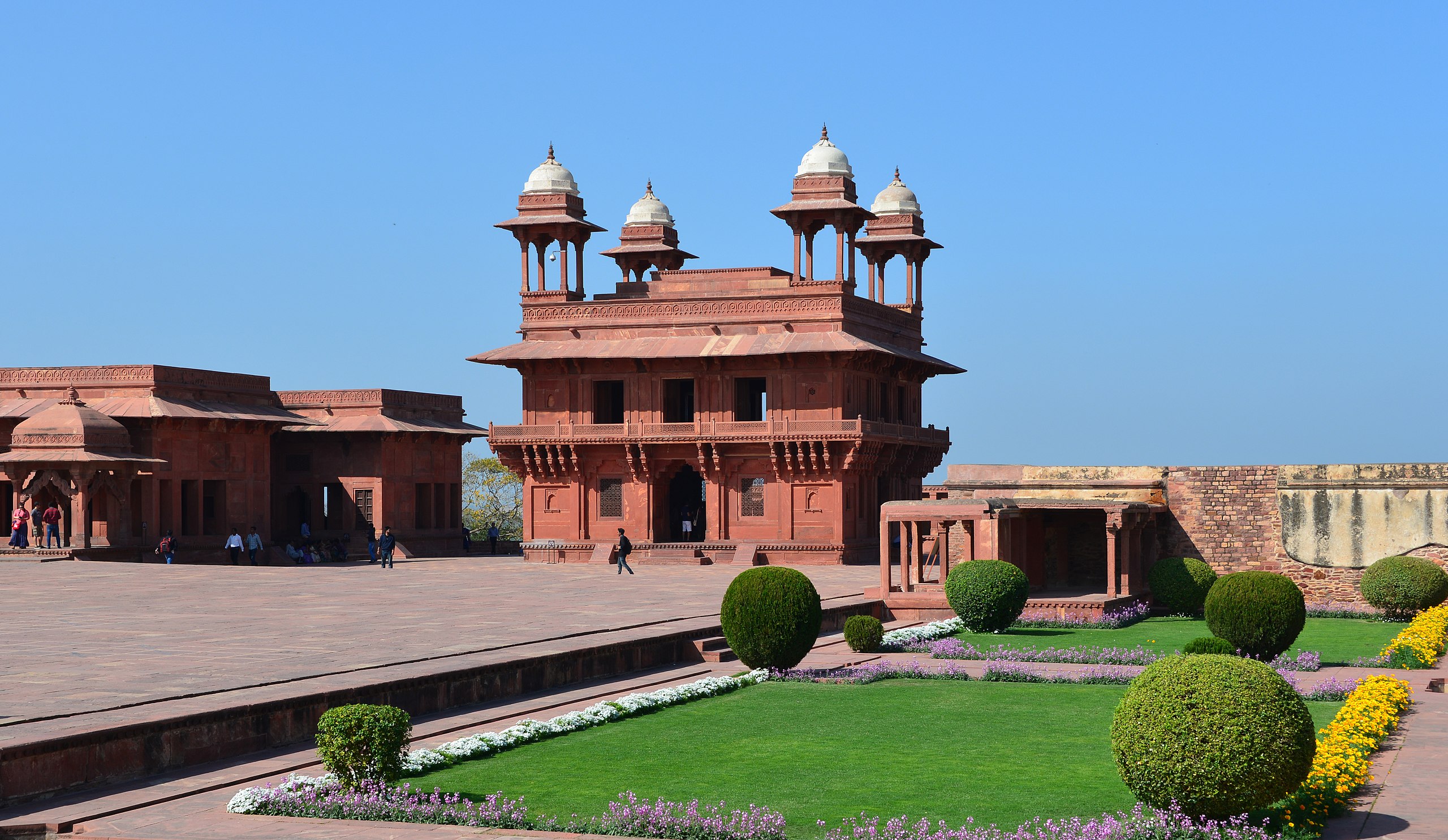 A building with a lawn on the foreground