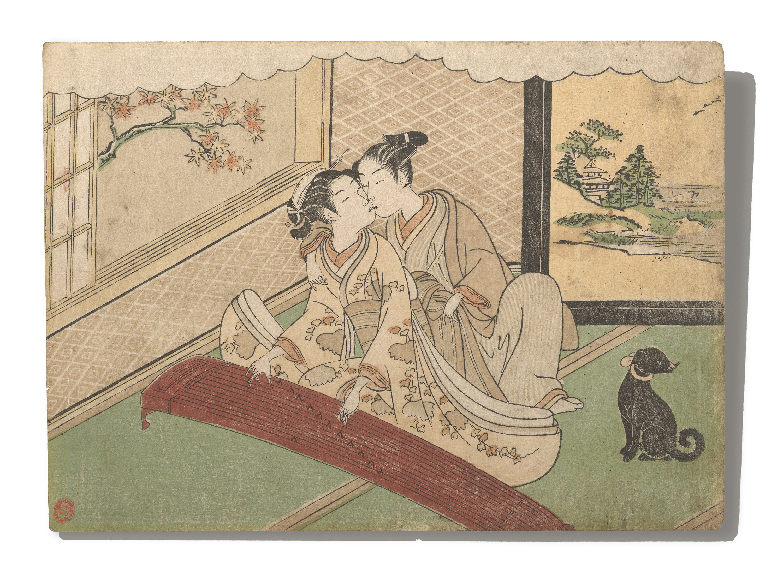 Two women in traditional Japanese clothing sitting on a tatami mat floor near a low table, with a black dog nearby.