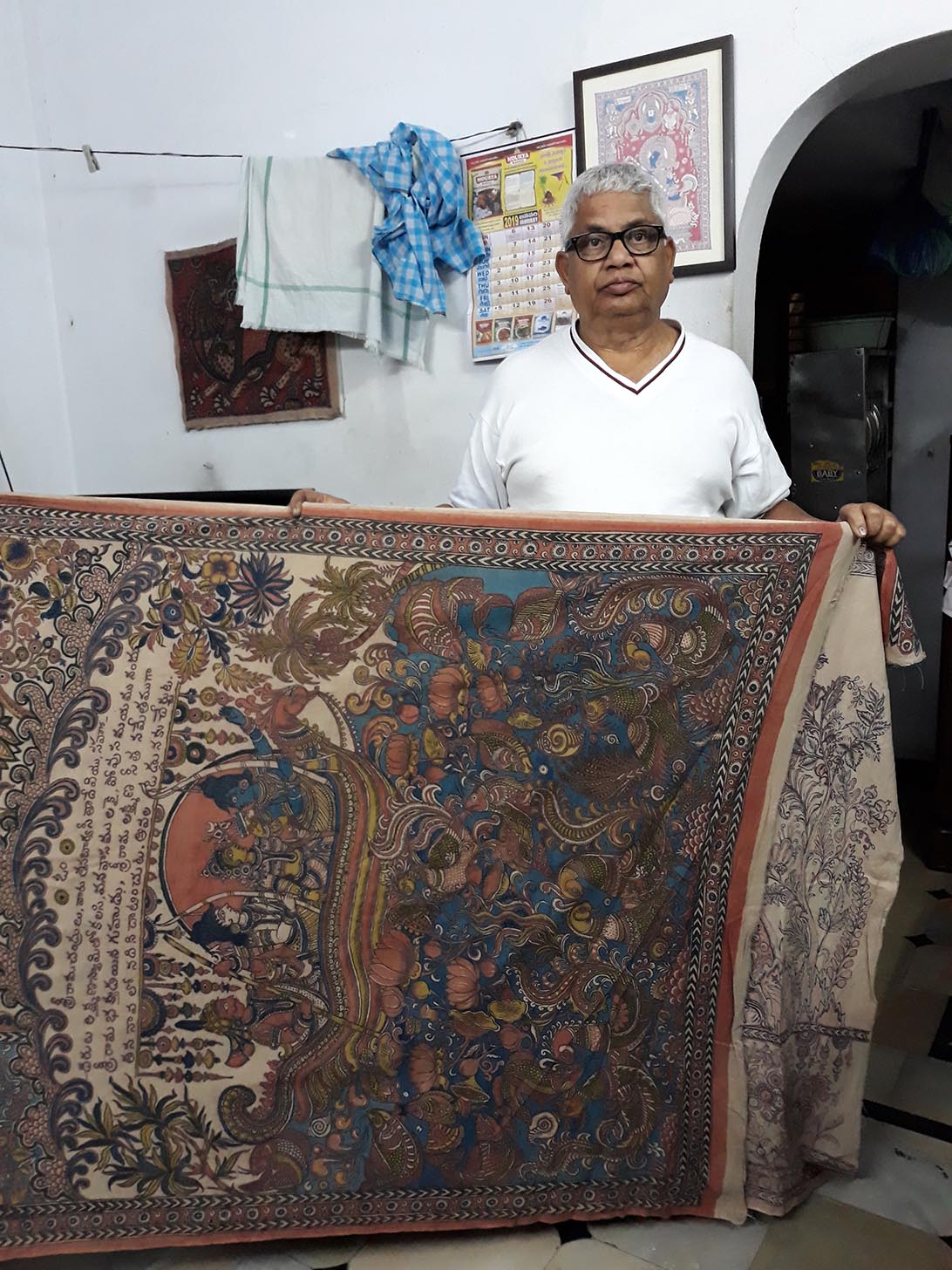 Man holding a printed textile