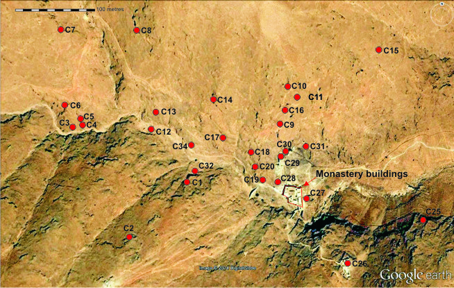 Map of the Judean Desert showing locations including Masada, Qumran, Ain Feshkha, En Gedi, and surrounding archaeological sites.