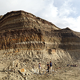 Photo of people standing in a quarry
