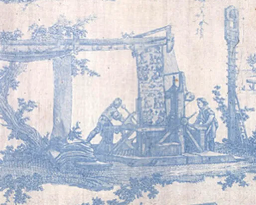 The image shows a faded blue and white textile depicting a scene with figures and architectural elements.