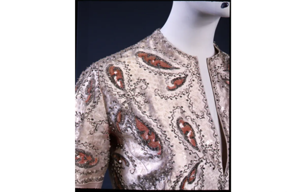 Jacket of formal evening dress: Saadi, 1947 Fall-Winter collection. Christian Dior. Made in Paris, France; used in Toronto. 1947. Silk satin, embroidered and beaded. 975.297.1.A Gift of Mrs. Kenneth Laidlaw Campbell.