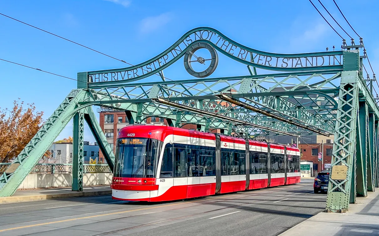 Bridge with street car going under it