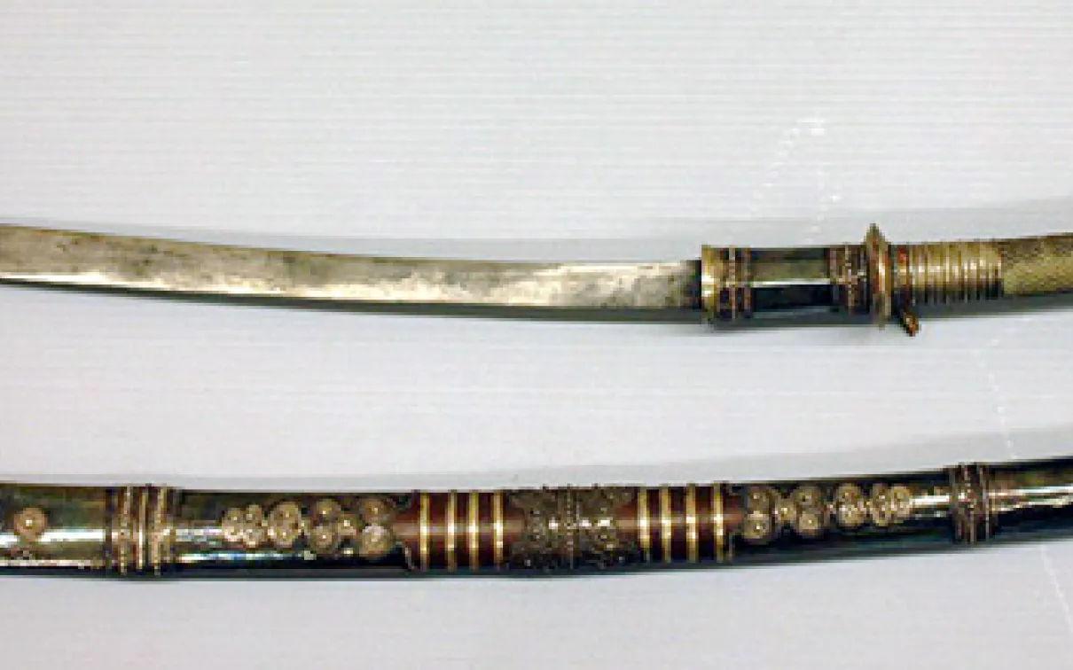 Burmese dha
