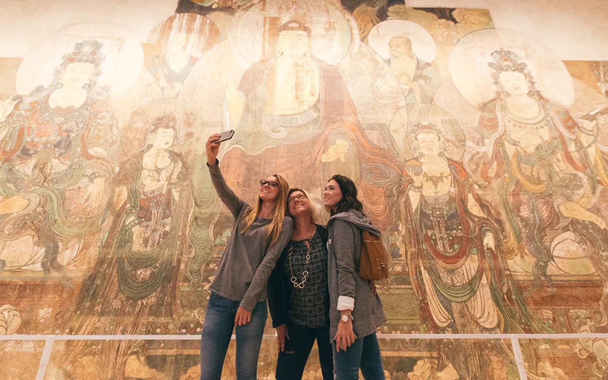 Visitors taking a selfie in the China galleries