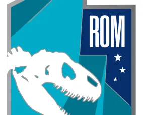 ROM with a white dinosaur skull silhouette and three white stars on a blue geometric background.